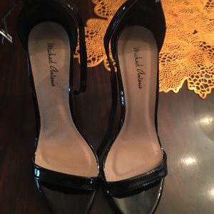 Shiny black one strap heel